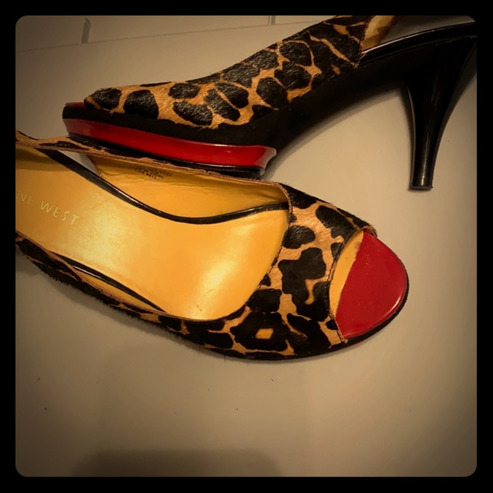 Nine West heels. Red bottom with leapard print.